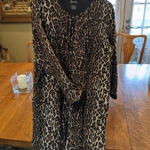 Cozy, fleece onesie in leopard print.